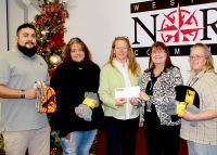 WVNCC presents items collected and a check to the Youth Services System Freeze Shelter. (L to R) Matt Badillo, WVNCC student and SCARSI Club member, Dara Whitemn, WVNCC student and SCARSI Club member, Tammy Krause, director of development, Youth Services System Freeze Shelter, Joyce Britt, faculty advisor SCARI CLUB, Misty Pullen, WVNCC student and SCARSI Club member.