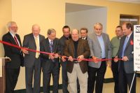 Ribbon-cutting ceremonies are held on the Weirton campus of West Virginia Northern Community College formally opening the $2.78 millionclassroom expansion project which began last May. From left are Weirton Campus Dean Mike Koon, who also is WVNCC’s vice president of workforce development; Chancellor James Skidmore of the Community and Technical College System of West Virginia; WVNCC President Martin J. Olshinsky; Brooke County Del. Phil Diserio; Hancock County Del. Randy Swartzmiller; Victor Greco of SMG Architects; Hancock County Del. Ronnie Jones; Weirton Councilman Fred Marsh; and Weirton Mayor George Kondik.