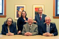 Orphy Klempa, seated center, will be honored for his outstanding community service at the annual fund-raising dinner sponsored by the Wheeling campus Friends of the College and the West Virginia Northern Community College Foundation. The dinner will be held March 23 in the Education Center lobby area, the Culinary Arts dining room and in the multi-purpose room. Planners for the event include Dr. Mary Marockie, president of the Foundation board of trustees, seated left, and Nick Zervos, president of the Wheeling Friends board, seated right. Standing, from left, are Rana Spurlock, fundraising and development assistant, and Dr. Martin J. Olshinsky, president of Northern.