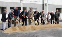 Turning over the ceremonial shovels of sand and dirt at Wednesday’s groundbreaking ceremony for the Applied Technology Center on West Virginia Northern Community College’s Wheeling campus are, from left, Dr. Martin J. Olshinsky, WVNCC president; Vic Greco of SMG Architects, the Wheeling firm that designed the project; Joe DeSalvo of DeSalvo Construction Co., low bidder for the work; Wheeling Mayor Andy McKenzie; Ohio County Commissioners David Sims and Tim McCormick, West Virginia Sen. Orphy Klempa; Kathy Ferrebee, student representative on the college Board of Governors; and John Clarke and Fred Renzella, WVNCC Board of Governors members. In the background is Greg Stewart, Ohio County administrator.