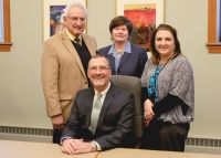 Joe Eddy, seated, president/CEO of Eagle Manufacturing in Wellsburg, will be honored for his dedication to West Virginia Northern Community College and for other voluntarism at the college’s annual fund-raising dinner to be held April 16 at the Education Center on the Wheeling campus. Standing, from left, are Nick Zervos, president of the board of the Wheeling campus Friends of the College; WVNCC President Vicki L. Riley; and Rana Spurlock, institutional advancement coordinator at the college.