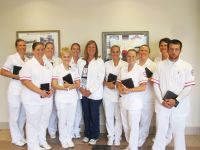 Tammy Aftanas, nursing instructor on the Weirton campus of West Virginia Northern Community College, has received a grant to provide mini iPads to 10 of her students for the current fall semester. From left are Melissa Boyuk, Amy Wiley, Erica Cline, Alexis Carte, Samantha Wells, Aftanas, Heather Molyneaux, Angel Zajac, Tracey King, Angelia Rhodes and Carl Hensley.