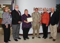 From left, WVNCC Office Administrator Debbie Bennett, WVNCC Dean Larry Tackett, WLU student Janice Hall, WLU Dean Thomas Michaud and donors Carol and Terry Wallace gather at the scholarship presentation.