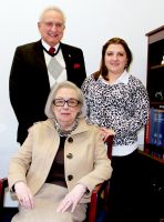 Dr. Mary Marockie, seated, will be honored by West Virginia Northern Community College at its annual fund-raising dinner March 15 at the college. Standing, from left, are Nick Zervos, president of the board of the Wheeling campus Friends of the College, and Rana Spurlock, the college’s fund raising and development assistant.