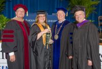 Debbie Bennett, second from left, was named Mountain State University Center Township’s “Student of the Year” during commencement ceremonies last week. From left are Dr. Timothy Glaid, lead leadership faculty at MSU Center Township; Bennett; Dr. Richard E. Sours, interim president of MSU; and Mark Ciccarelli, J.D., executive director of the Center Township campus.