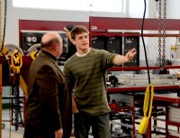 Patrick Marshall, a student in the Mechatronics class being conducted on the Weirton campus of West Virginia Northern Community College, points out some of the state-of-the-art Mechatronics lab equipment to Hancock County Del. Randy Swartzmiller. Mechatronics is a new program that preparesstudents to be electrical and industrial maintenance technicians and is part of the newly-opened addition at the campus.