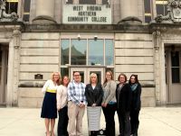 Representatives of groups teaming up to offer a special workshop in the fight against domestic violence meet in front of the B&O Building on the Wheeling campus of West Virginia Northern Community College where the event will be held Oct. 26 from 5:30-8 p.m. From left are Rhonda Hayes and Kimberly Scott with the West Virginia University master’s in social work program; Josh Benyl and Trish Flanigan, Wheeling YWCA; and Tiffany Henderson, Maura Kreitzer and Courtney Bolton, WVU Graduate Social Work Officers.